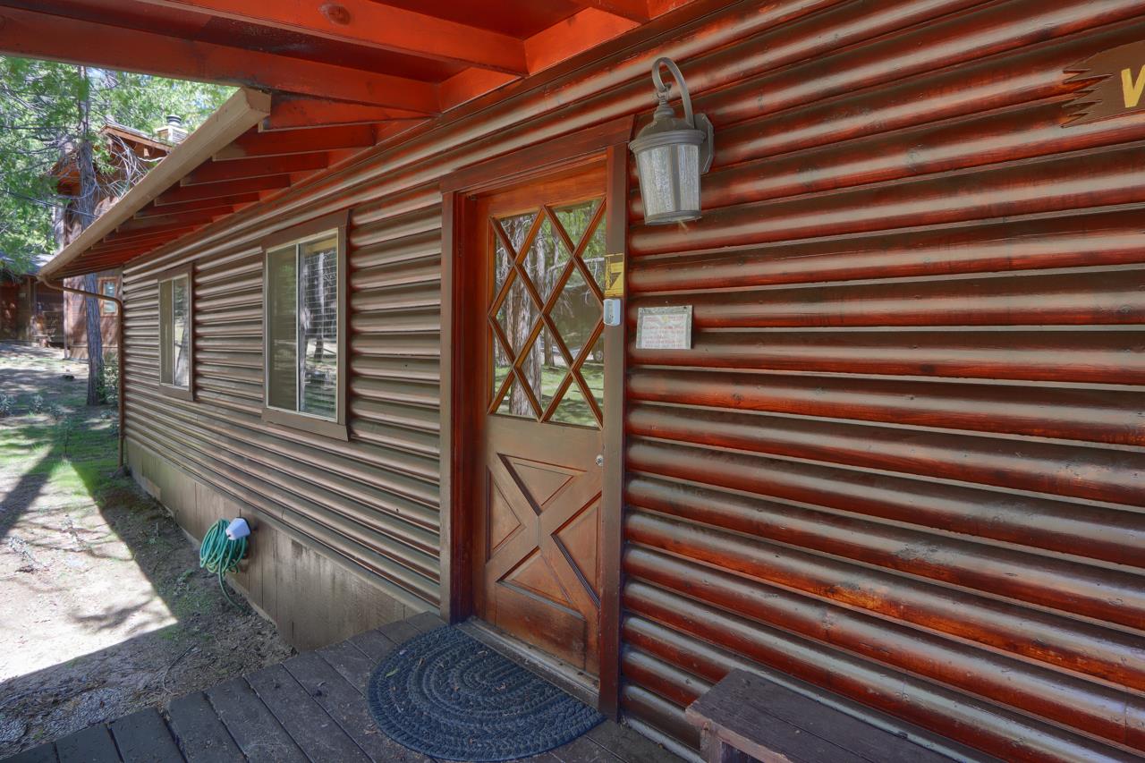 2628 West Bruce Road Wawona, CA 95389 - Photo 6 of 33 a pathway of a house with wooden fence
