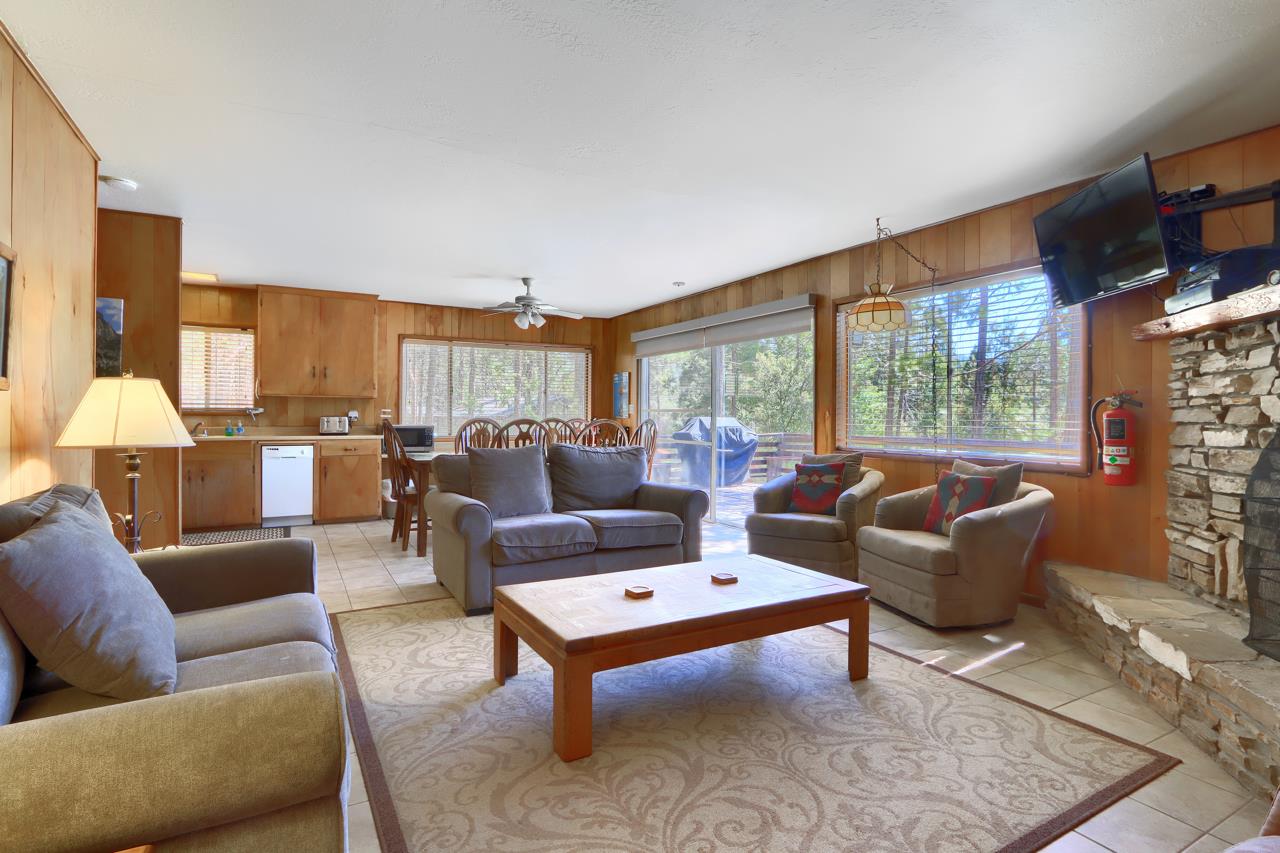 2628 West Bruce Road Wawona, CA 95389 - Photo 7 of 33 a living room with furniture and a fireplace