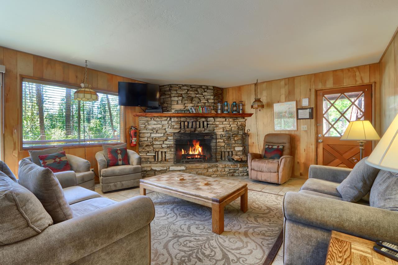 2628 West Bruce Road Wawona, CA 95389 - Photo 8 of 33 a living room with furniture and a fireplace