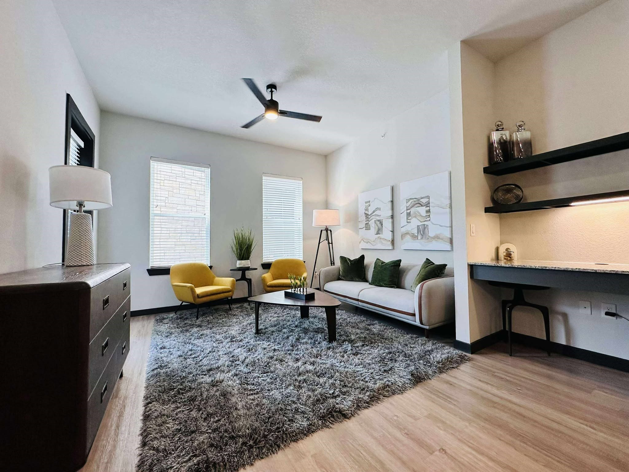 2603 North Fry Road, Unit A1 Katy, TX 77449 - Photo 8 of 13 a living room with furniture and wooden floor