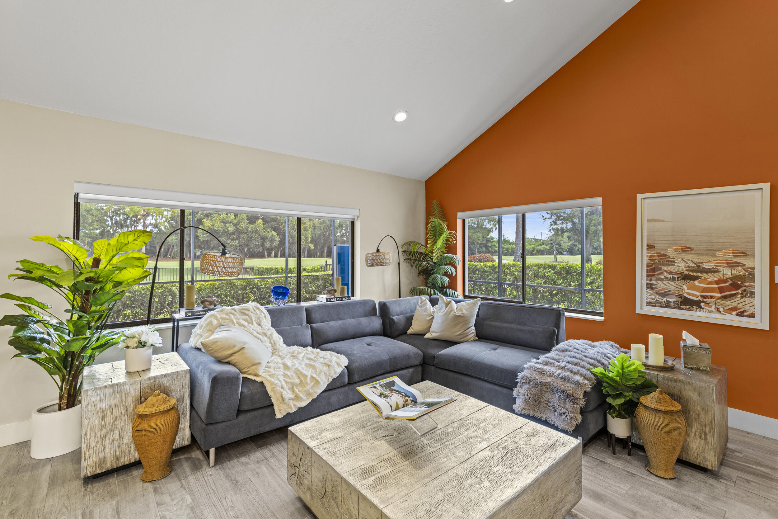 10718 Boca Woods Lane Boca Raton, FL 33428 - Photo 19 of 98 a living room with furniture and a large window with garden view