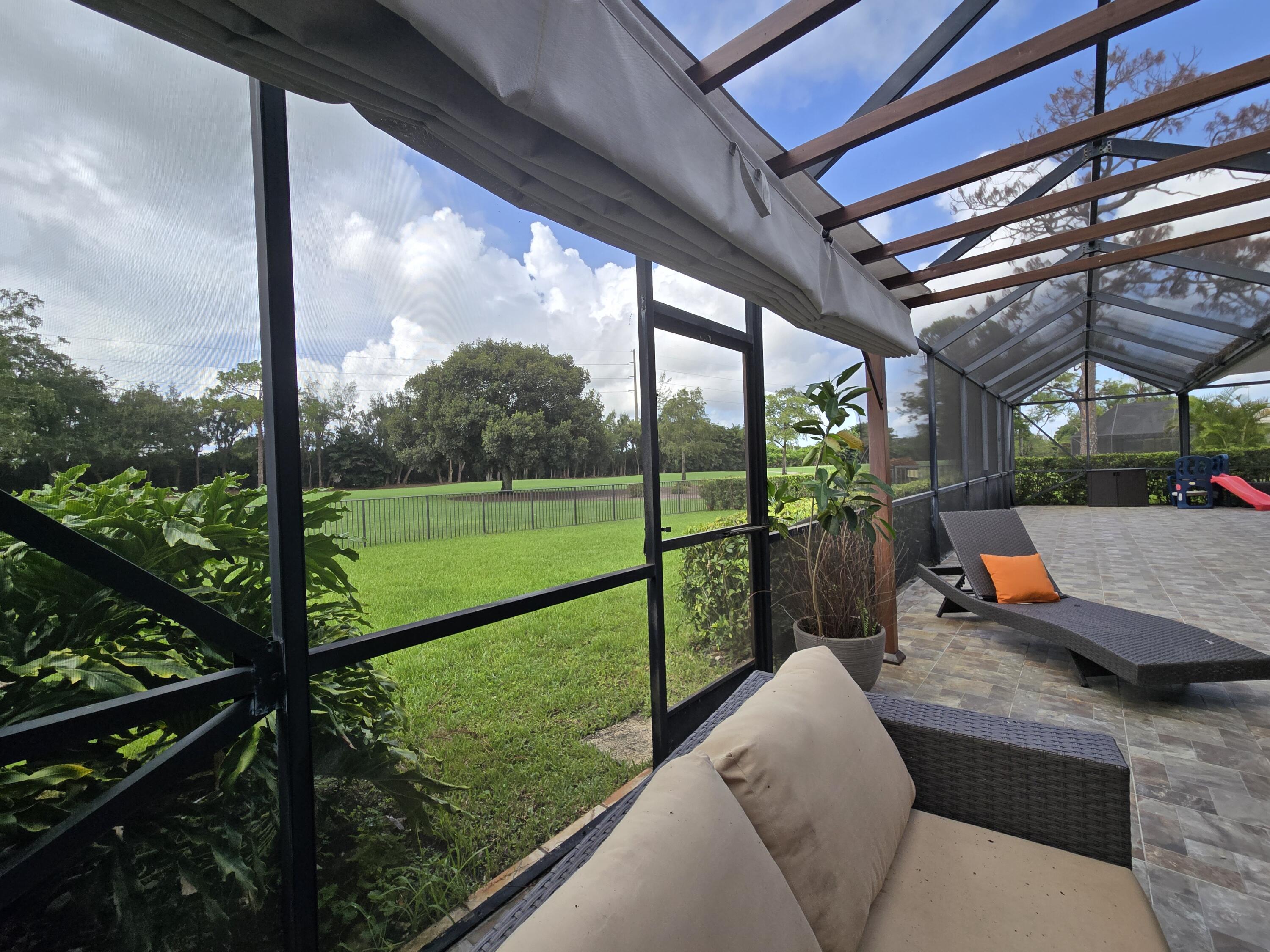 10718 Boca Woods Lane Boca Raton, FL 33428 - Photo 28 of 98 sun shade