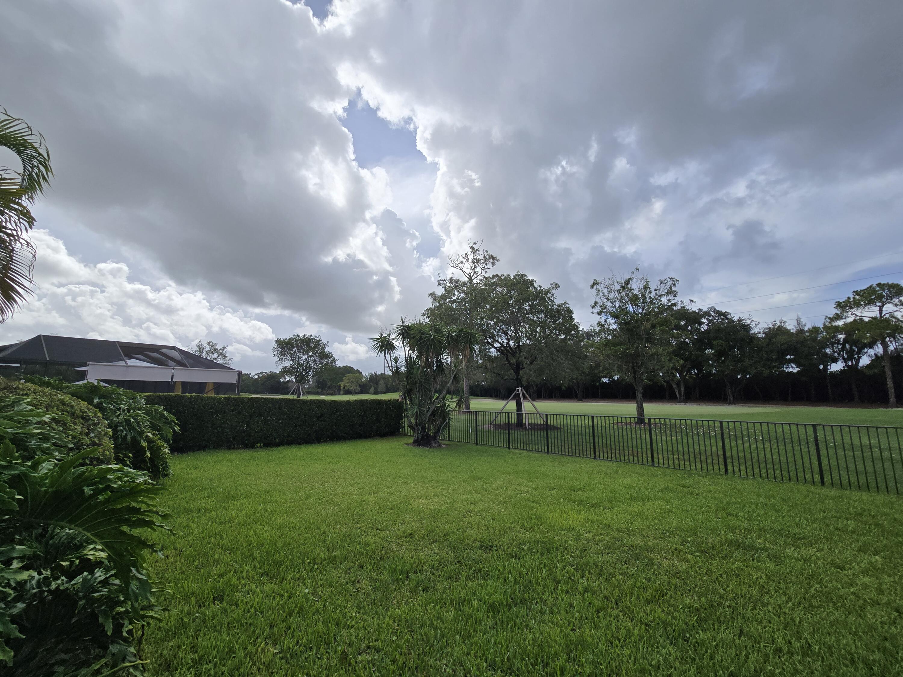 10718 Boca Woods Lane Boca Raton, FL 33428 - Photo 31 of 98 a view of building with outdoor space