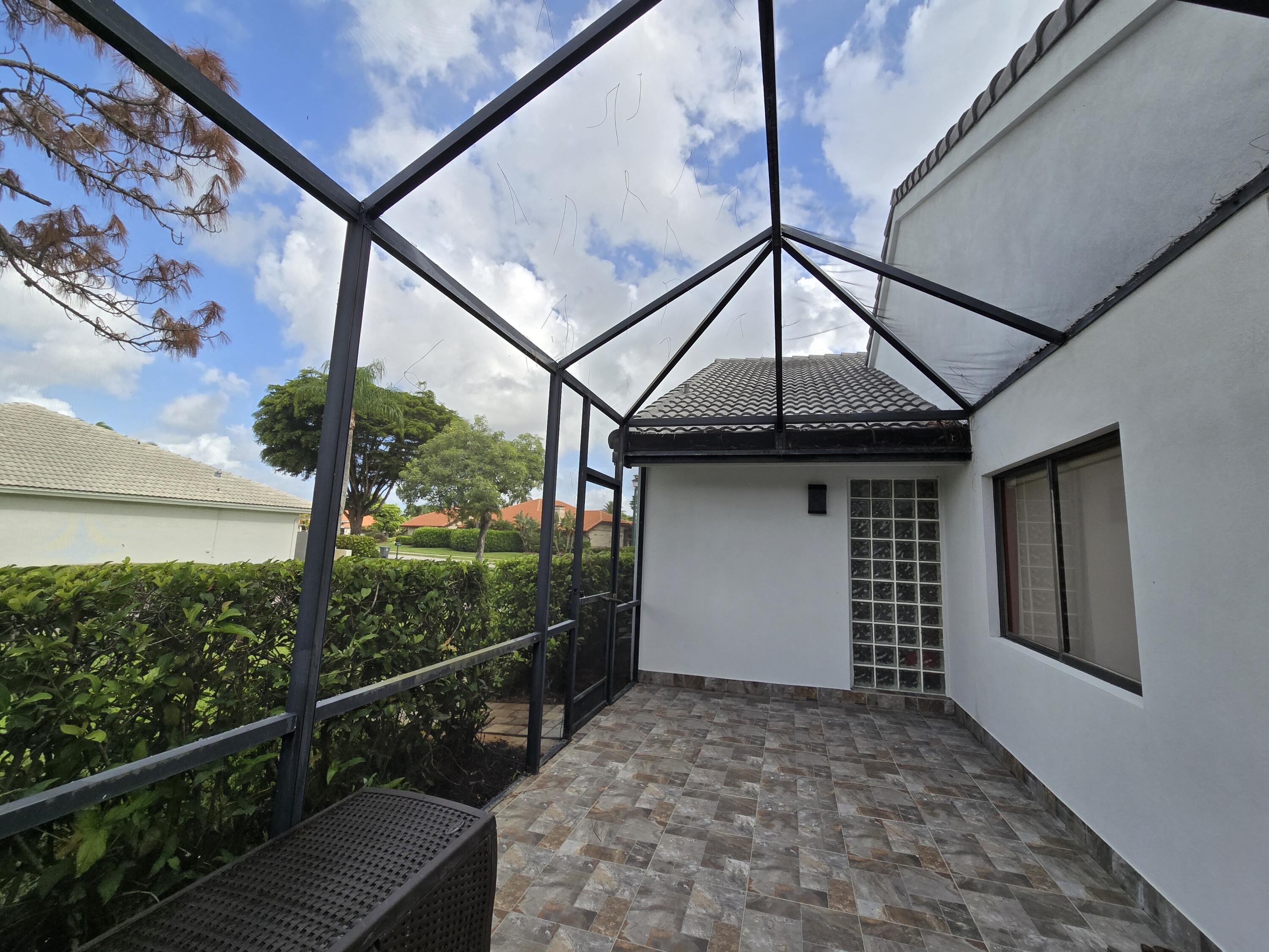 10718 Boca Woods Lane Boca Raton, FL 33428 - Photo 36 of 98 L shaped patio