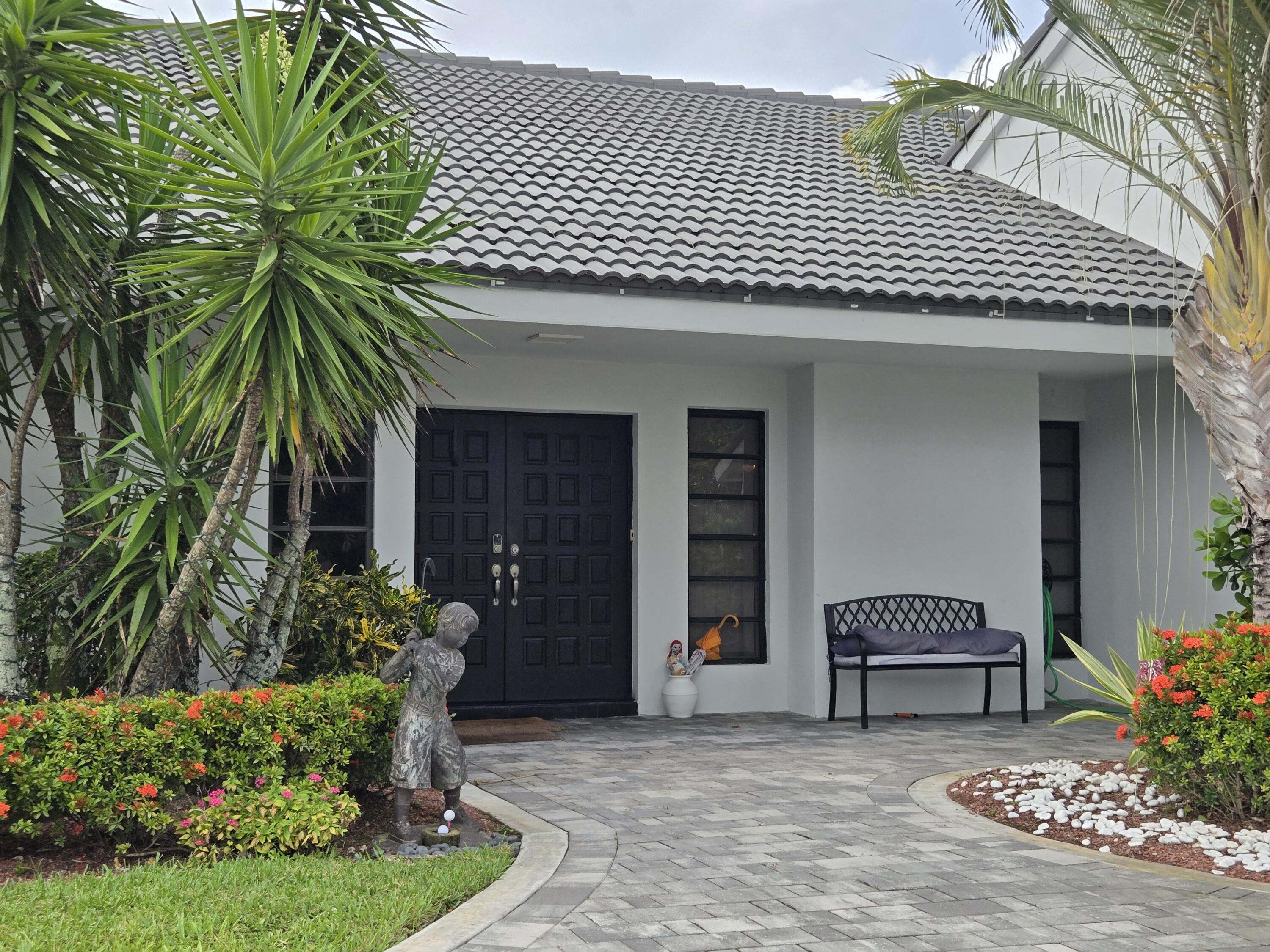 10718 Boca Woods Lane Boca Raton, FL 33428 - Photo 10 of 98 front porch