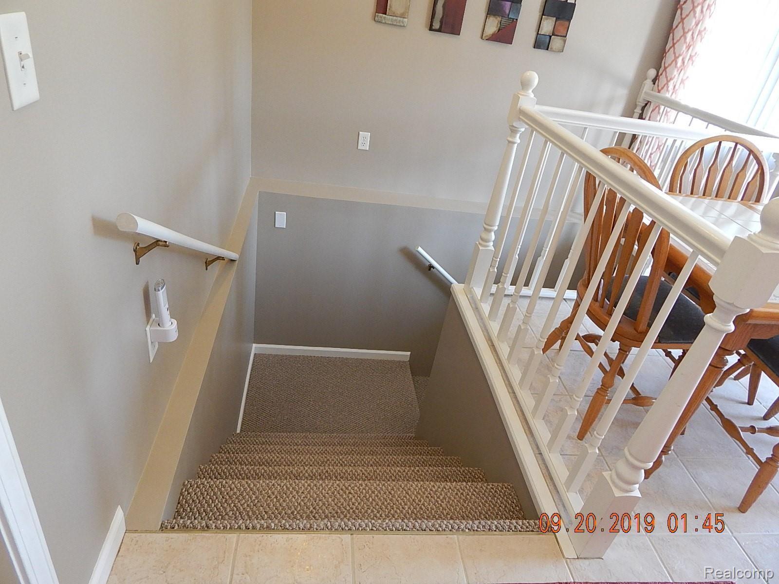7905 Munger Road Ypsilanti, MI 48197 - Photo 45 of 73 bsmt stairs.JPG