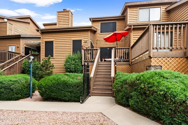 front view of a house with a small yard