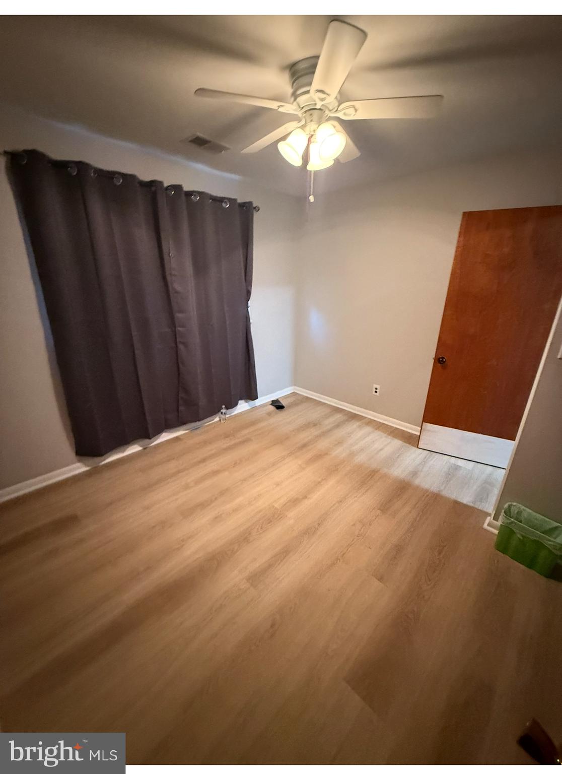 3102 Laurel Bush Road Abingdon, MD 21009 - Photo 11 of 28 a view of a big room with wooden floor and fan