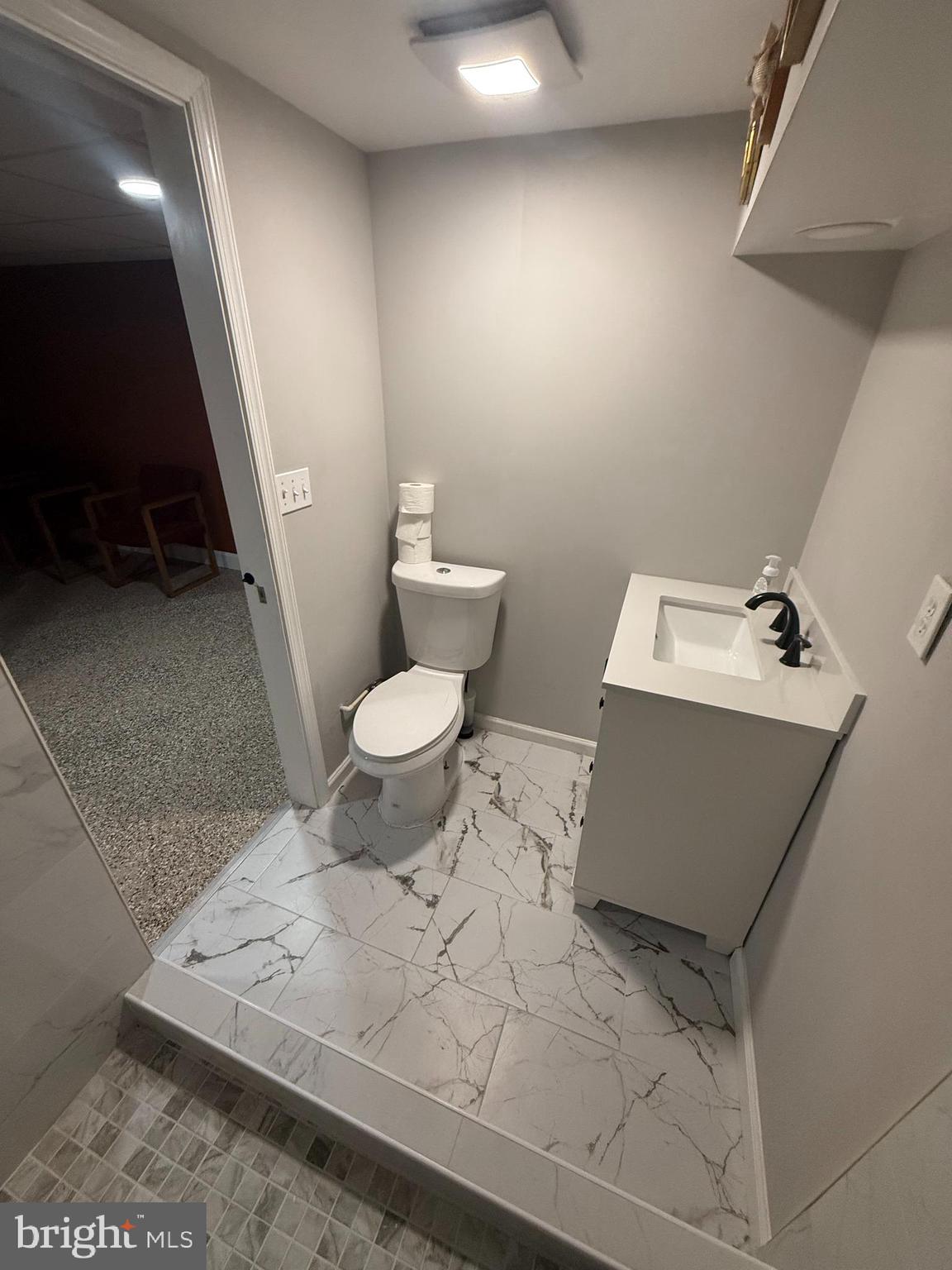 3102 Laurel Bush Road Abingdon, MD 21009 - Photo 12 of 28 a bathroom with a toilet sink and mirror