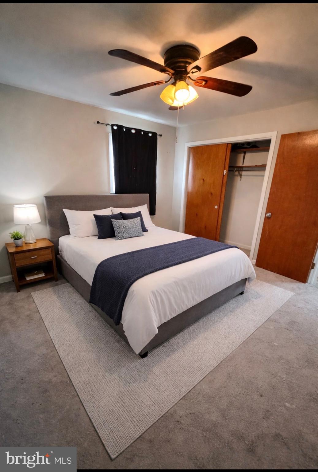 3102 Laurel Bush Road Abingdon, MD 21009 - Photo 15 of 28 a bedroom with a bed and a chandelier