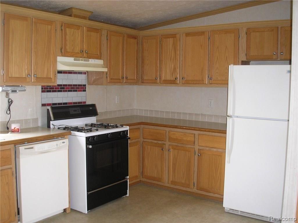5938 North Hurds Corner Road Gagetown, MI 48735 - Photo 7 of 9 Another view of the kitchen with appliances included.