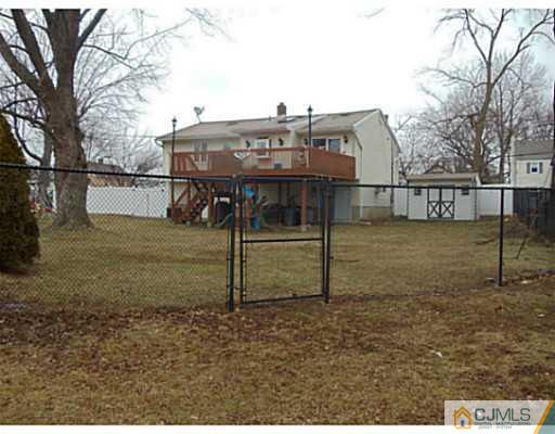 435 Crows Mill Road Fords, NJ 08863 - Photo 4 of 24 a view of a house with a backyard