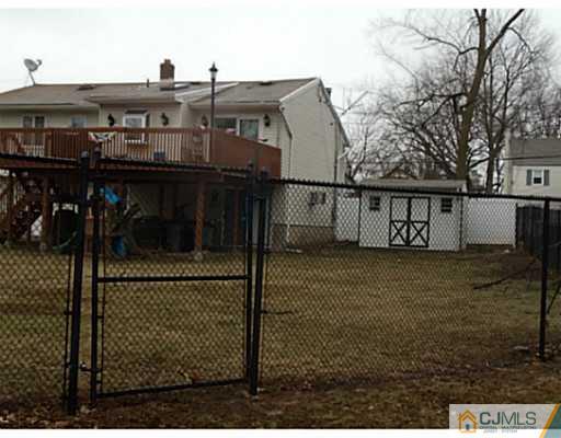 435 Crows Mill Road Fords, NJ 08863 - Photo 5 of 24 a view of a house with backyard