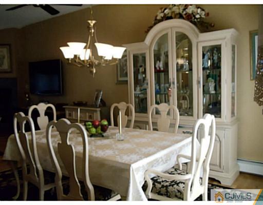 435 Crows Mill Road Fords, NJ 08863 - Photo 7 of 24 a view of a dining room with furniture