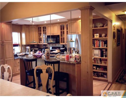 435 Crows Mill Road Fords, NJ 08863 - Photo 8 of 24 a view of a dining room with furniture and window