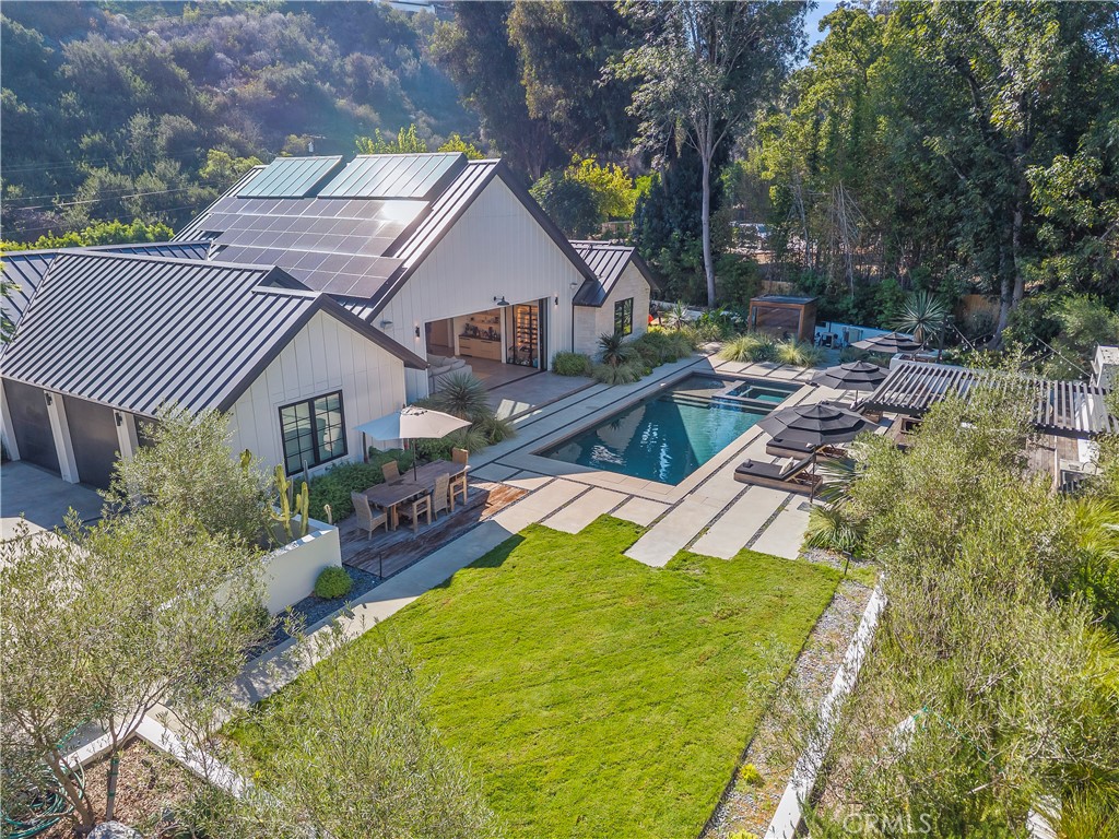 4874 Sun Valley Road Del Mar, CA 92014 - Photo 3 of 15 a aerial view of a house with swimming pool next to a yard