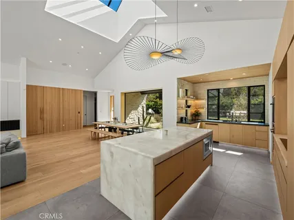 a view of living room with furniture and window