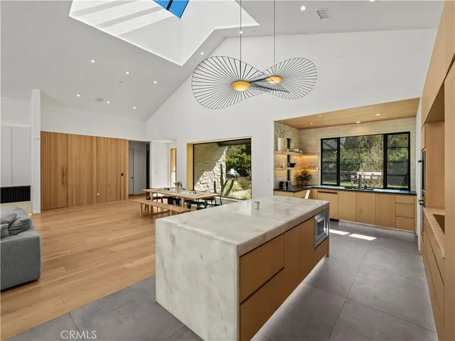a view of living room with furniture and window