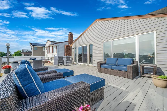 a view of a terrace with sitting area