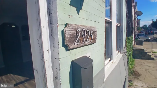 a door with a tree on the side