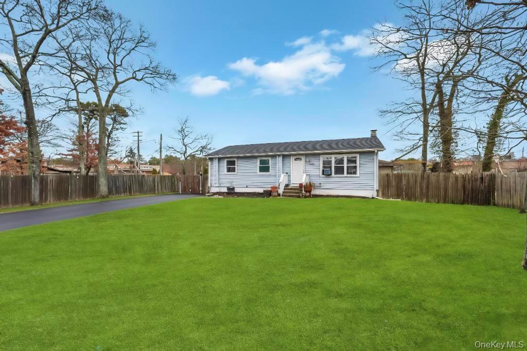 19 Windus Road Shirley, NY 11967 - Photo 4 of 29 a view of a house with backyard and a tree