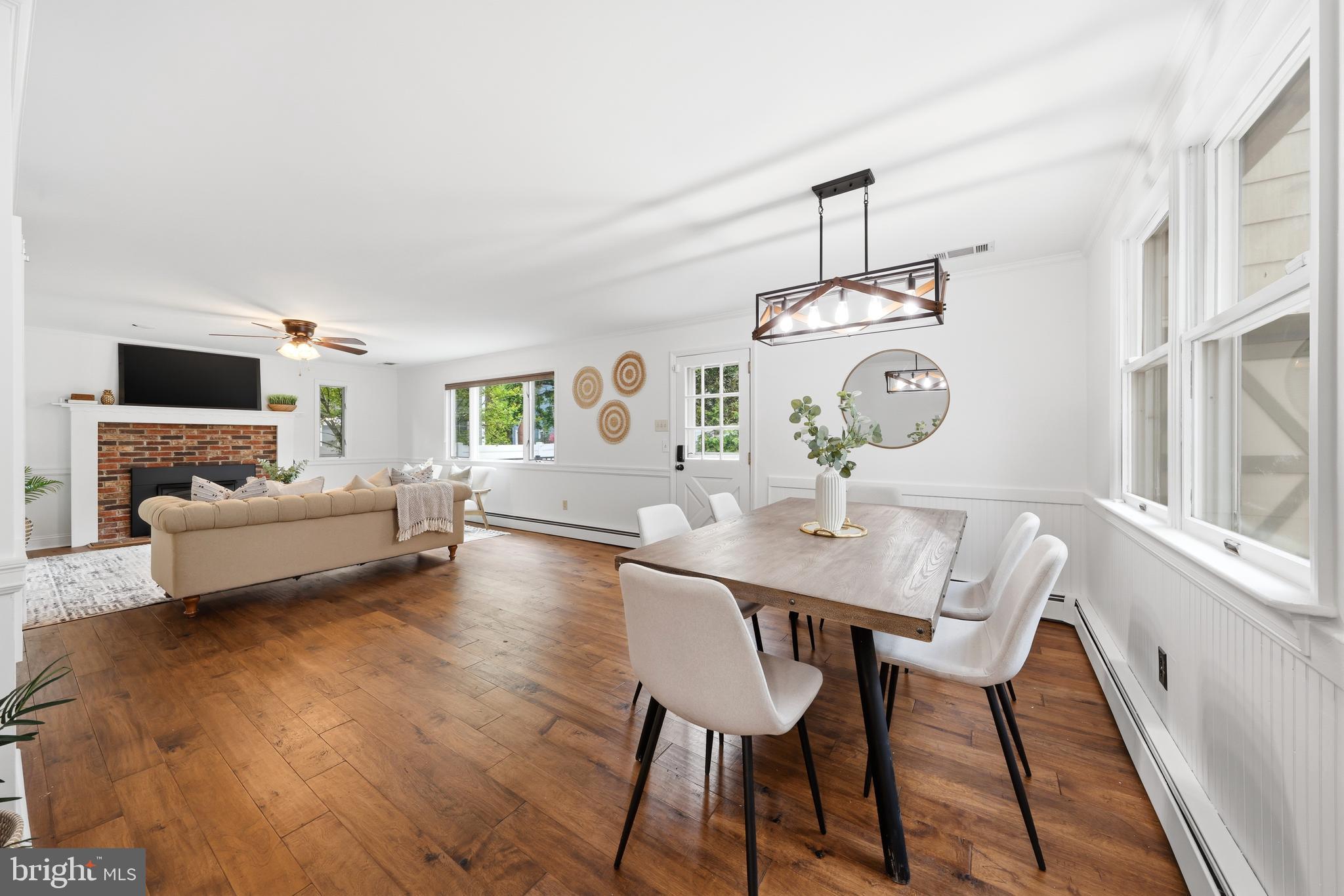 404 Centre Street Haddonfield, NJ 08033 - Photo 11 of 38 a view of a dining room with furniture wooden floor and a chandelier