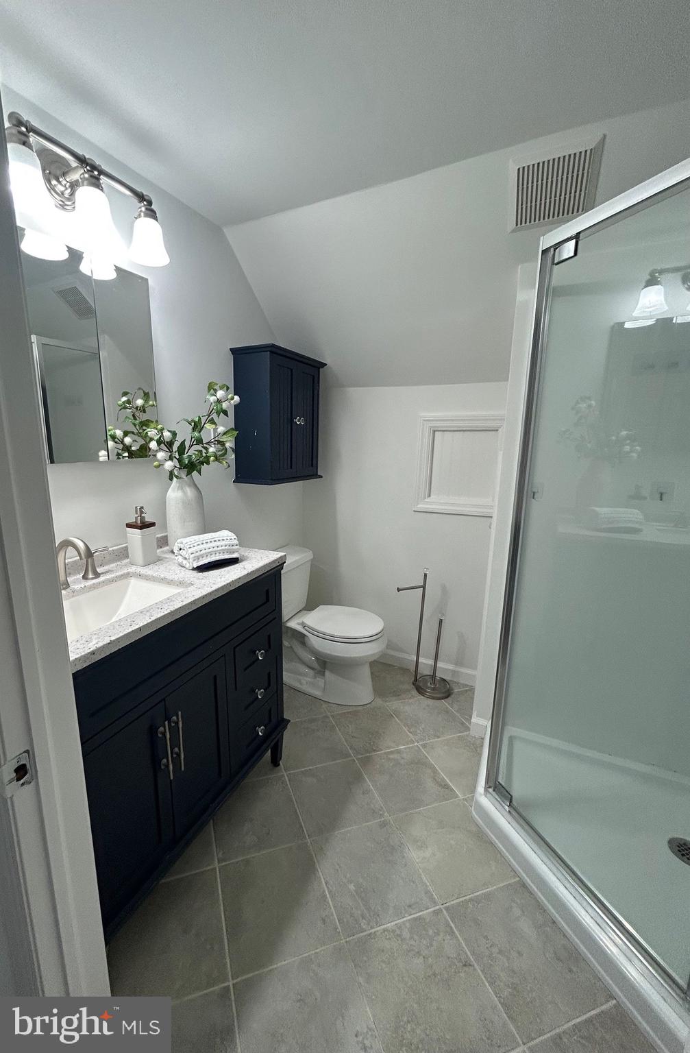 404 Centre Street Haddonfield, NJ 08033 - Photo 25 of 38 a bathroom with a sink toilet and shower