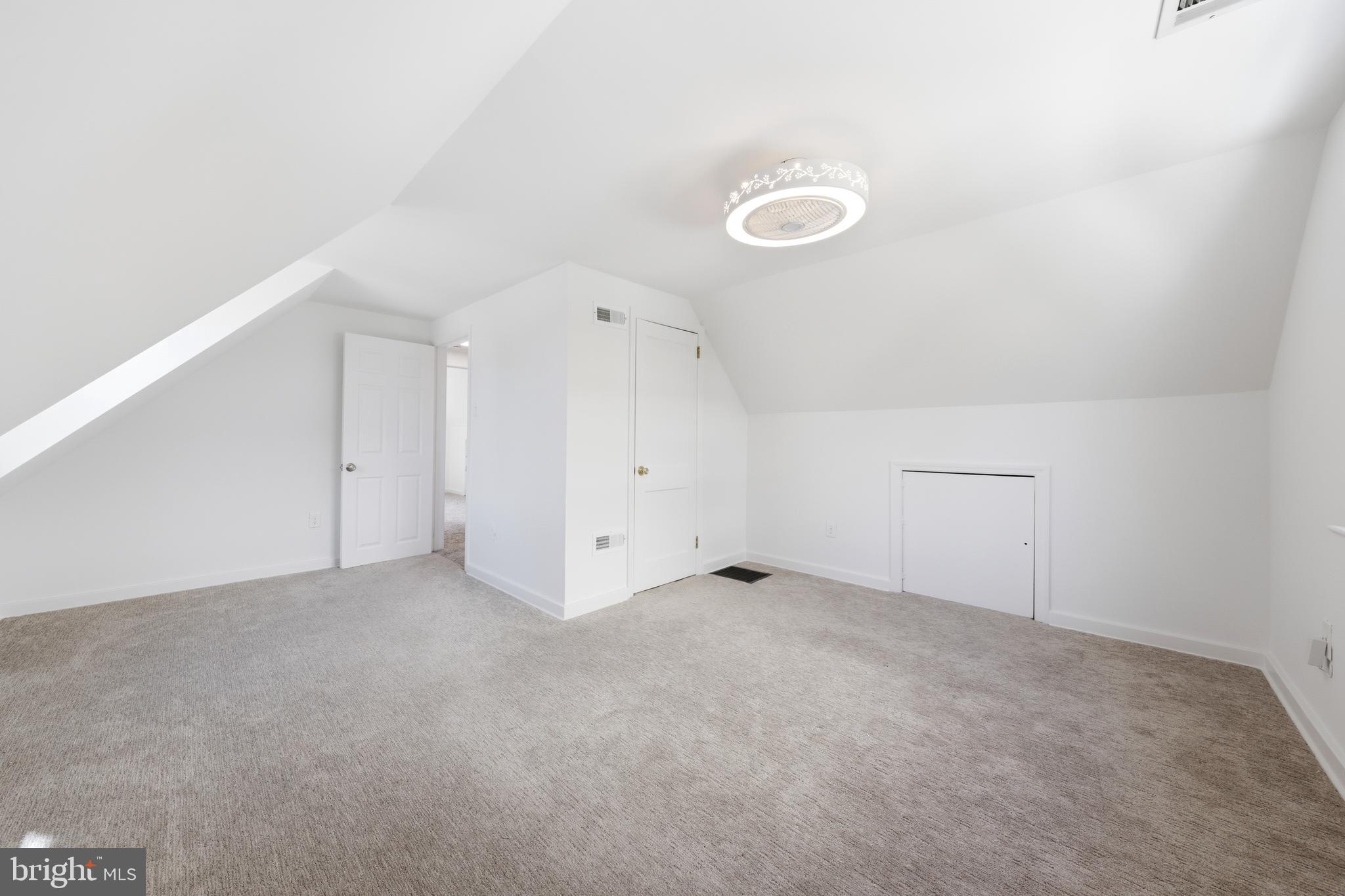 404 Centre Street Haddonfield, NJ 08033 - Photo 26 of 38 an empty room with a fan and a window