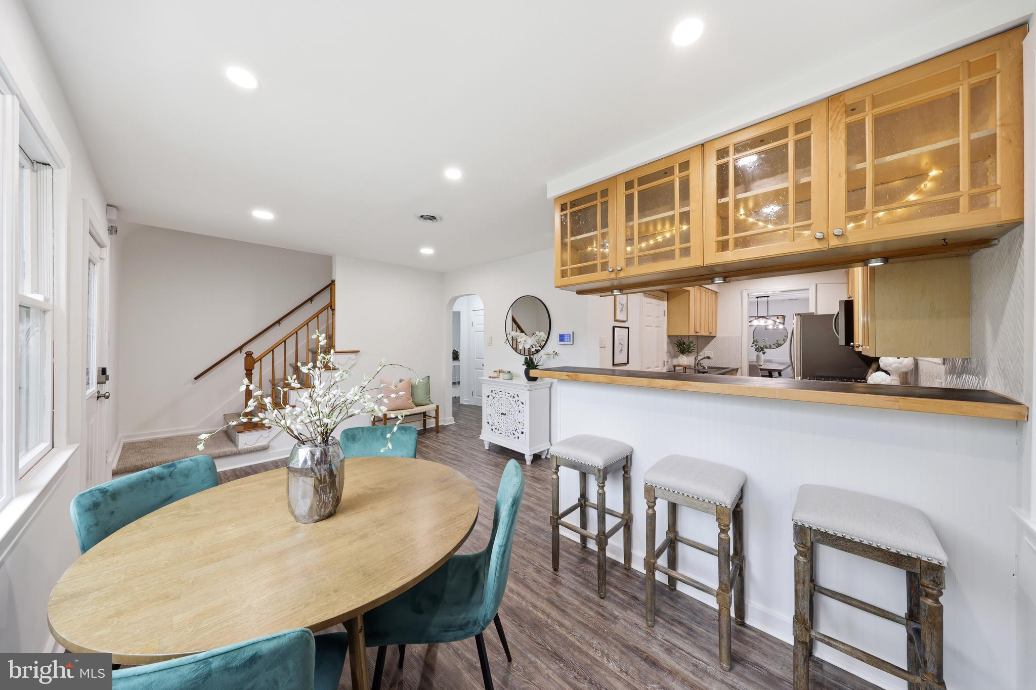 404 Centre Street Haddonfield, NJ 08033 - Photo 6 of 38 a view of dining room kitchen with furniture and wooden floor