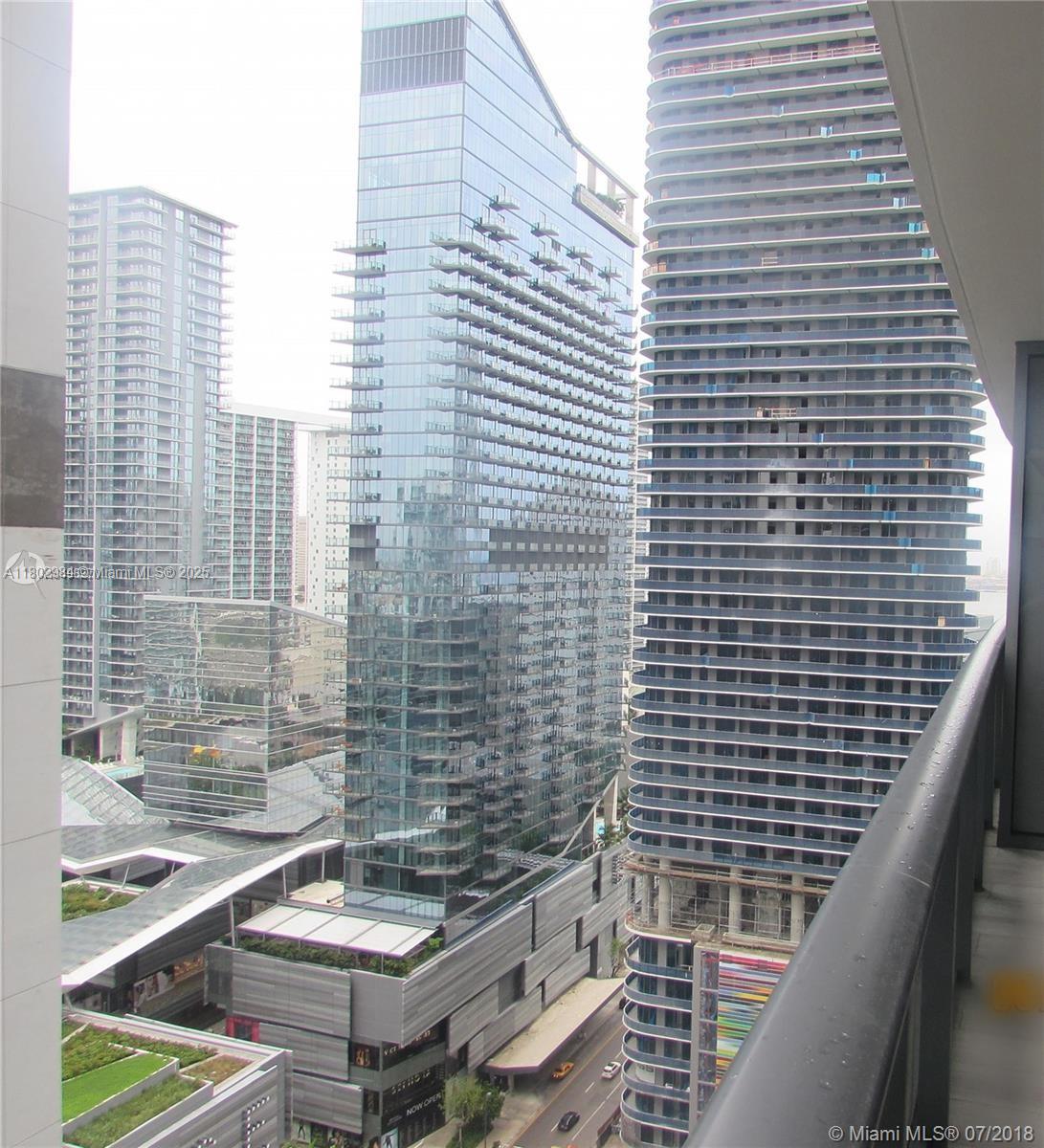 55 Southwest 9th Street, Unit 3409 Miami, FL 33130 - Photo 18 of 28 a bathroom with a sink and a shower