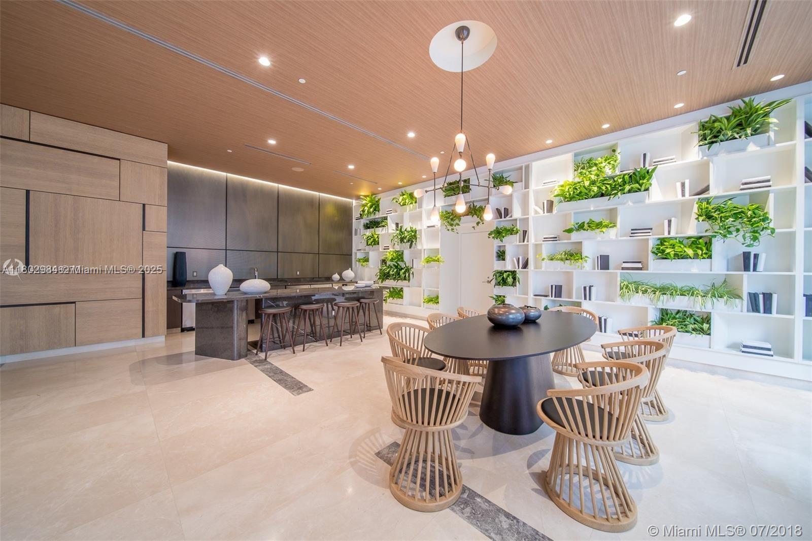 55 Southwest 9th Street, Unit 3409 Miami, FL 33130 - Photo 24 of 28 a living room with furniture and a chandelier