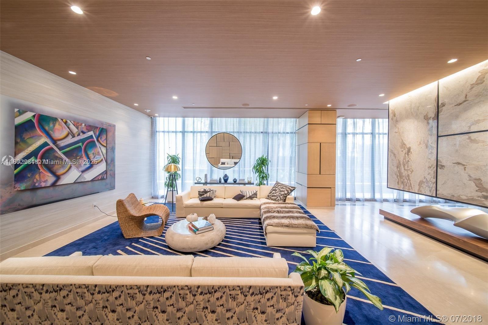 55 Southwest 9th Street, Unit 3409 Miami, FL 33130 - Photo 25 of 28 a living room with furniture and a large window