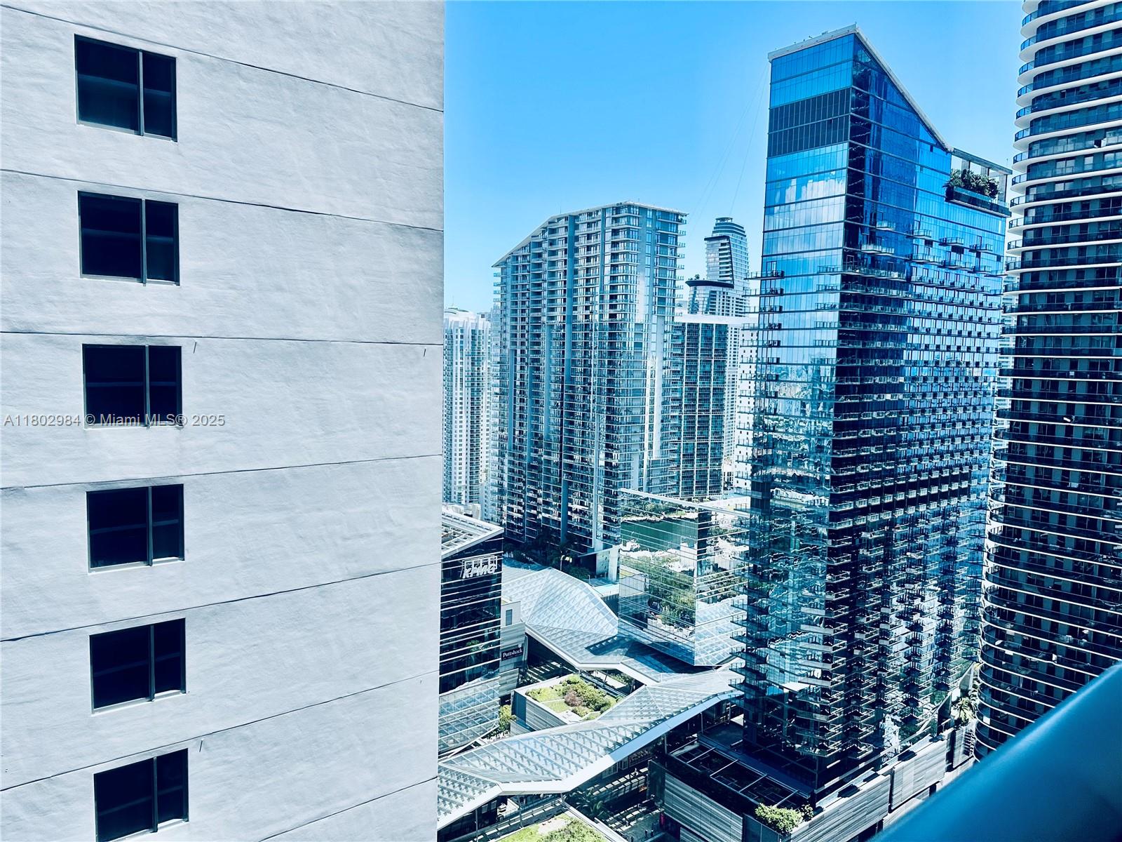 55 Southwest 9th Street, Unit 3409 Miami, FL 33130 - Photo 6 of 28 a bathroom with a toilet and a shower