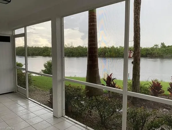 a view of a lake from a balcony