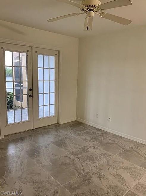 1305 Mainsail Drive, Unit 1002 Naples, FL 34114 - Photo 6 of 10 a view of an empty room with a window