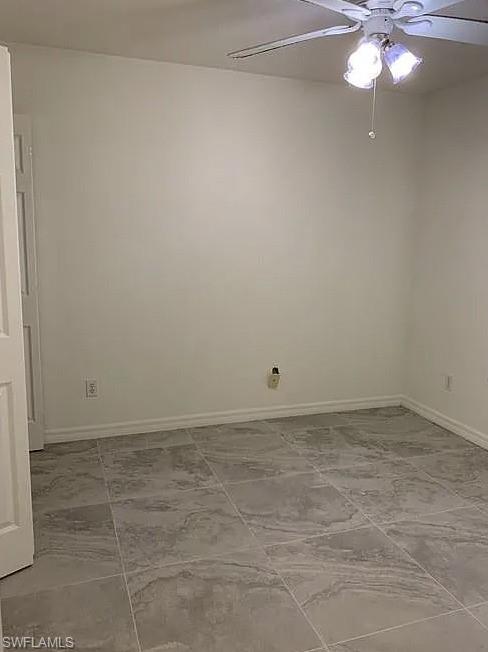 1305 Mainsail Drive, Unit 1002 Naples, FL 34114 - Photo 9 of 10 a view of a room with an empty space