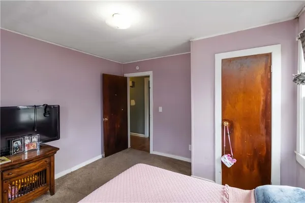 a livingroom with a flat screen tv