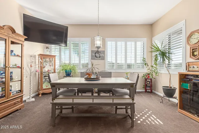 a view of a livingroom with furniture and window