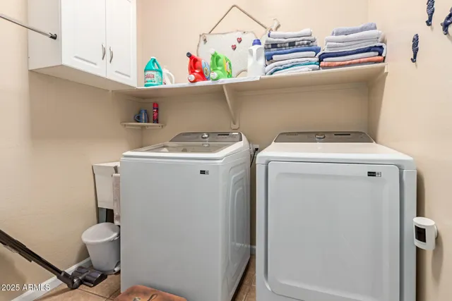 a building outdoor space with patio furniture and potted plants