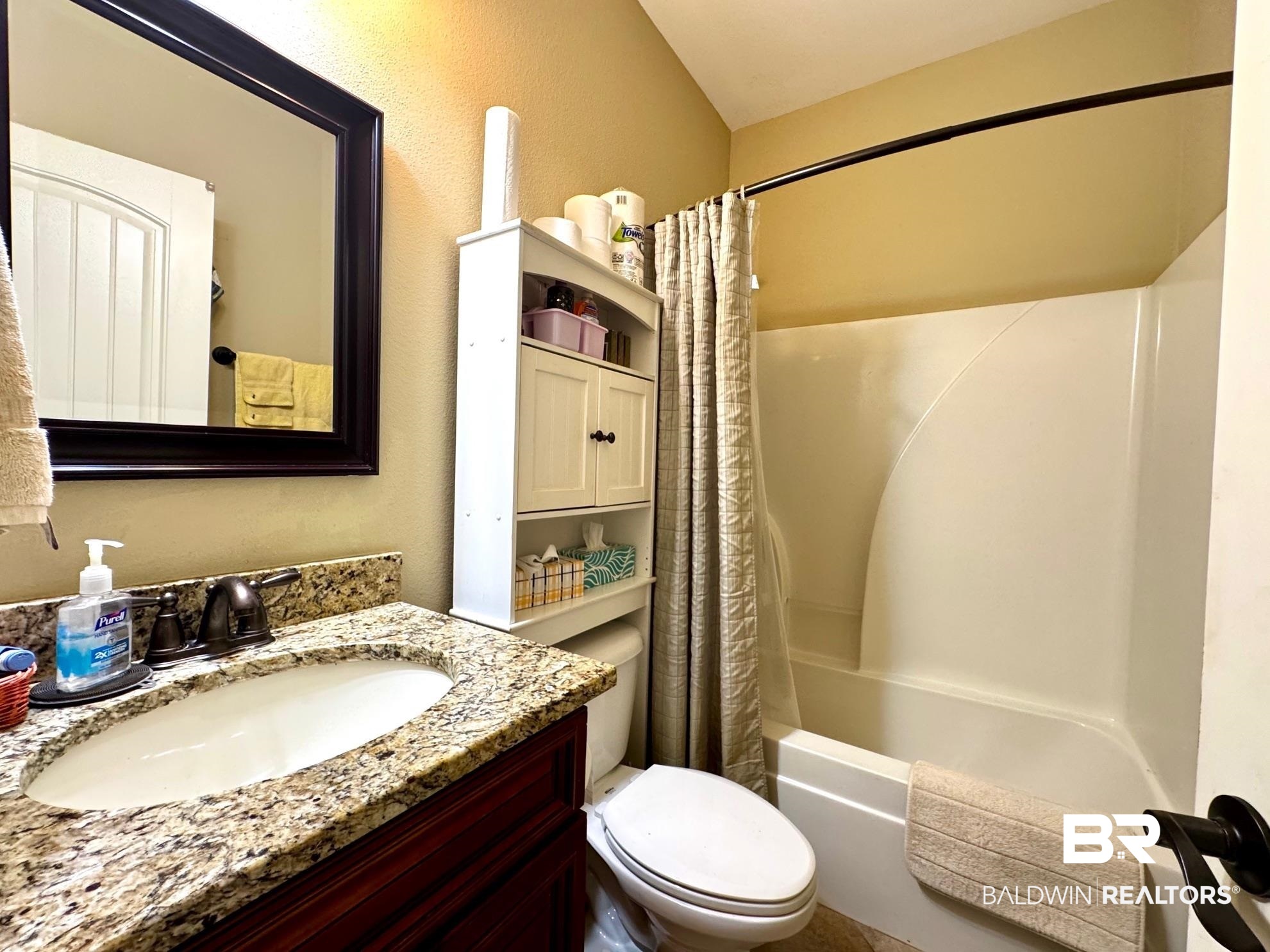 1030 Crown Walk Drive Foley, AL 36535 - Photo 22 of 40 Full bathroom with toilet, vanity, and shower / bath combo