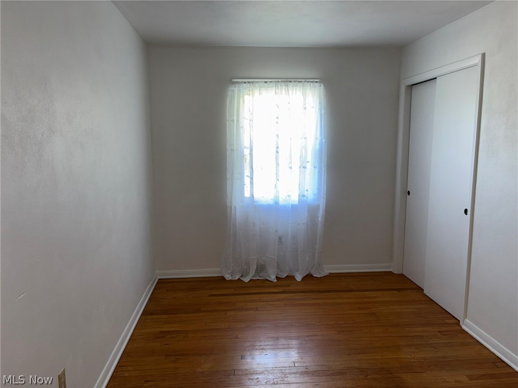 2140 Claus Road Vermilion, OH 44089 - Photo 12 of 50 Bedroom with hardwood floors