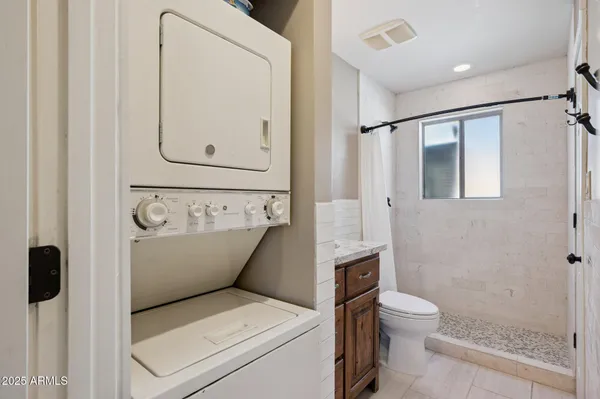 a view of bathroom with a toilet sink and tub
