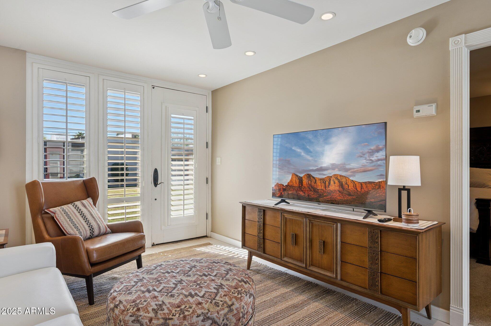 4208 North 38th Street, Unit 2 Phoenix, AZ 85018 - Photo 6 of 20 a bedroom with furniture and a window