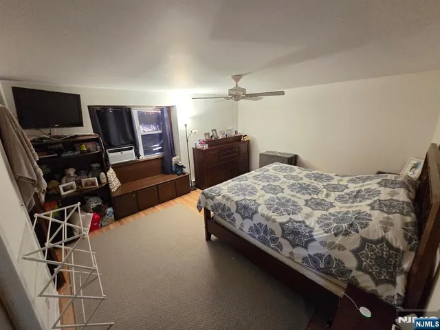 a bedroom with a bed and furniture