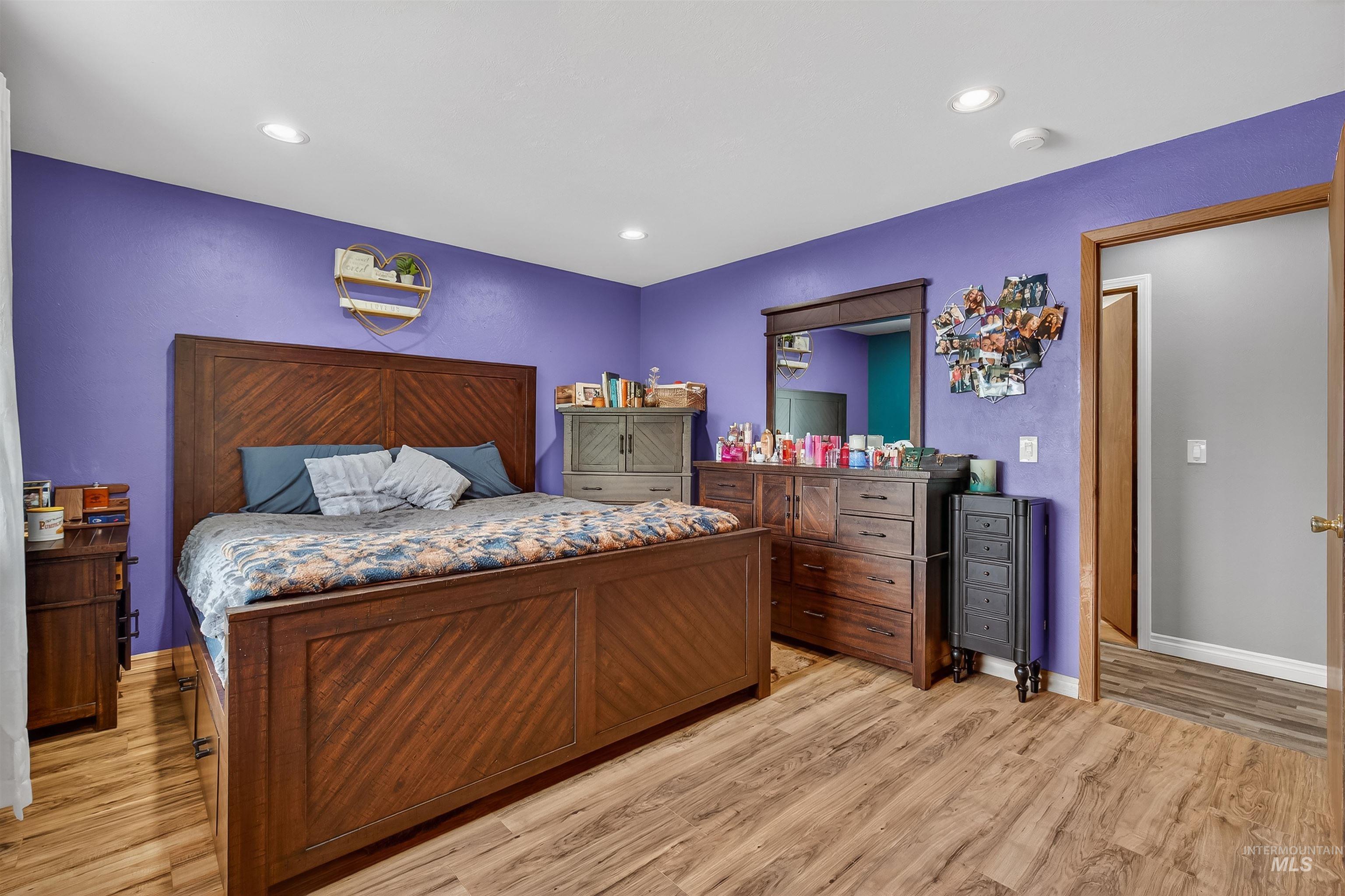 3725 11th Street Lewiston, ID 83501 - Photo 22 of 46 Bedroom featuring light wood-style floors and recessed lighting