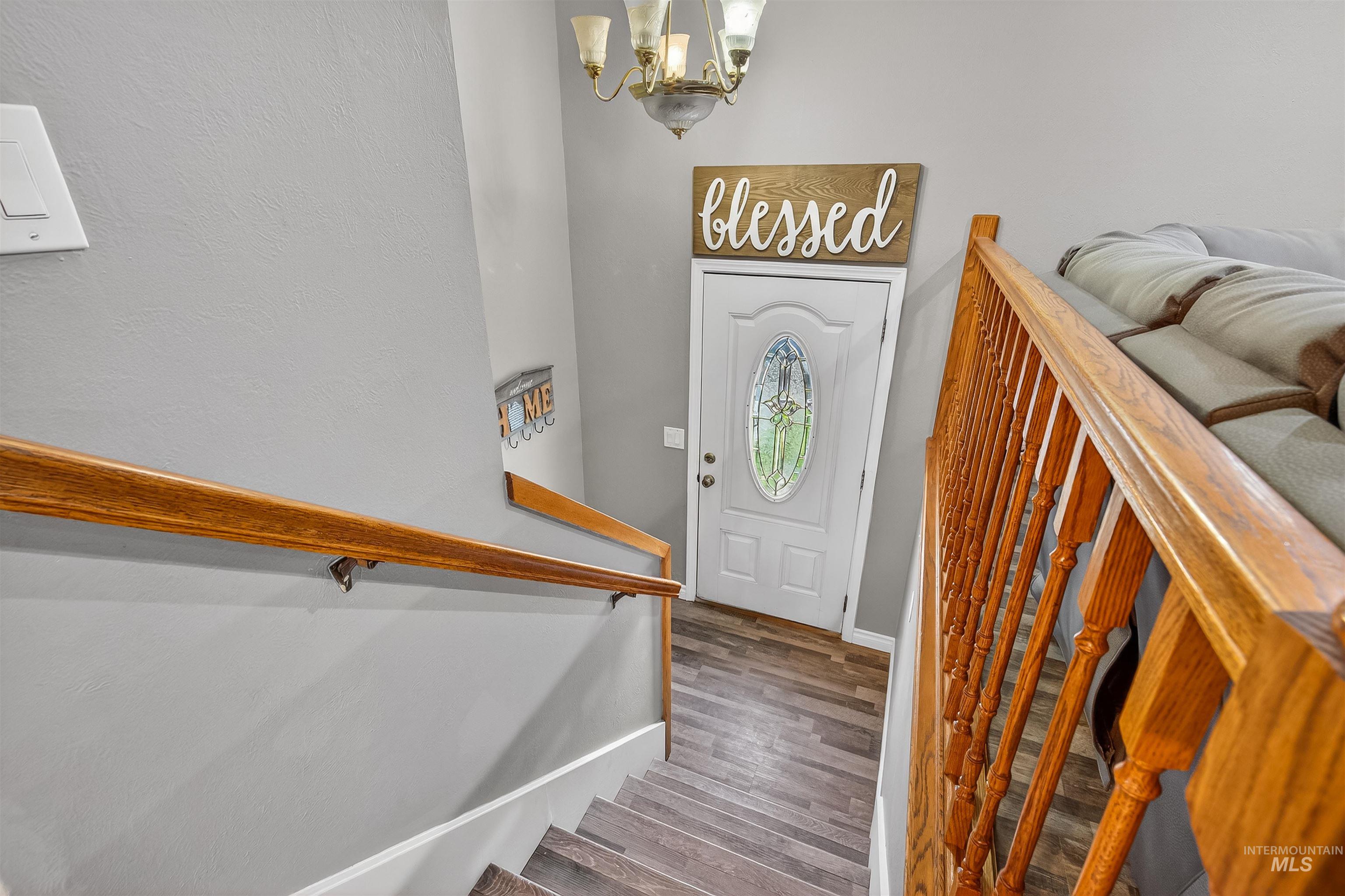 3725 11th Street Lewiston, ID 83501 - Photo 27 of 46 Entryway with suspended lighting and wood finished floors