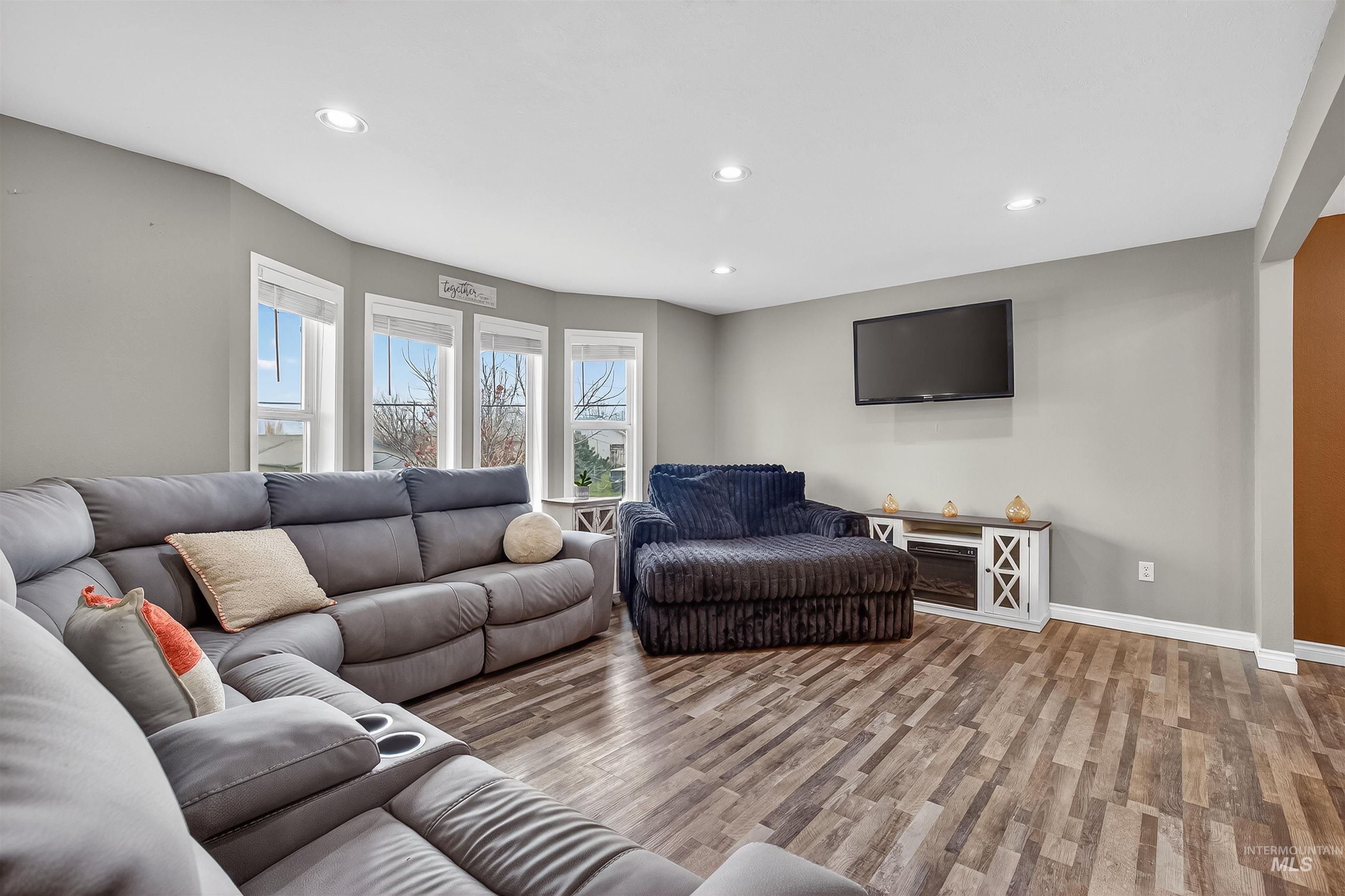 3725 11th Street Lewiston, ID 83501 - Photo 3 of 46 Living area featuring wood finished floors and recessed lighting