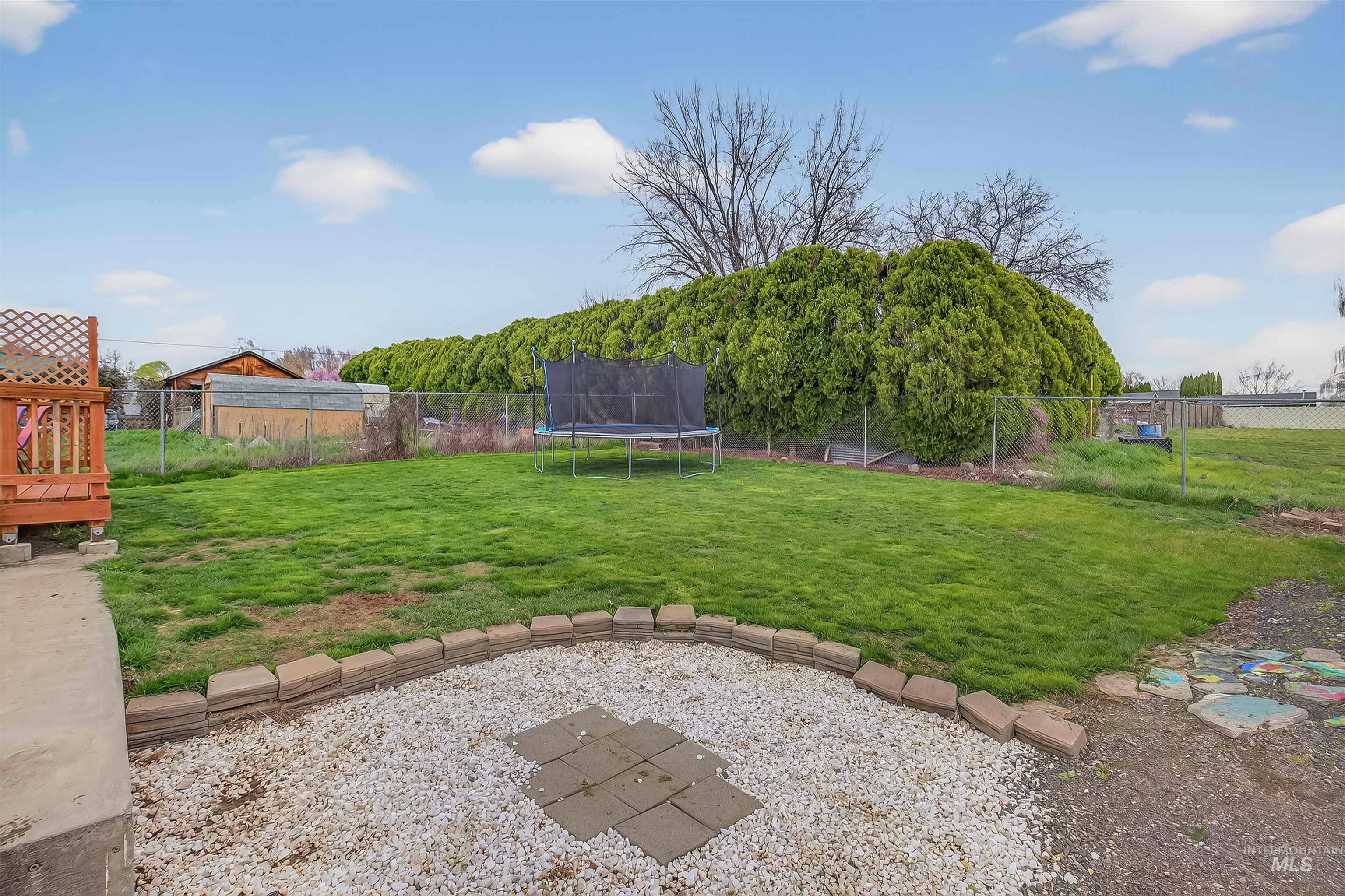 3725 11th Street Lewiston, ID 83501 - Photo 46 of 46 Fenced backyard with a trampoline