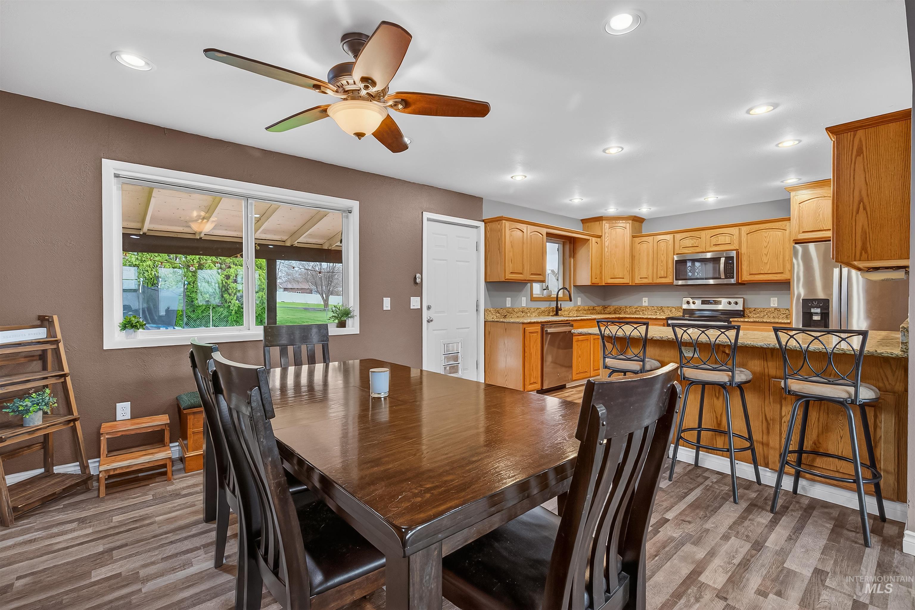 3725 11th Street Lewiston, ID 83501 - Photo 6 of 46 Dining space with recessed lighting, light wood finished floors, and a ceiling fan