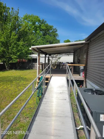 a front view of a house with a ocean view